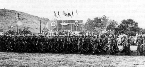 Picture - 37th Infantry Division passes 10th  Infantry Division in review before leaving Fort Riley