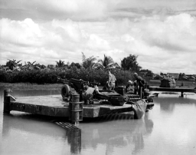 PICTURE - Portable Firing Platform With 105-mm, Howitzer